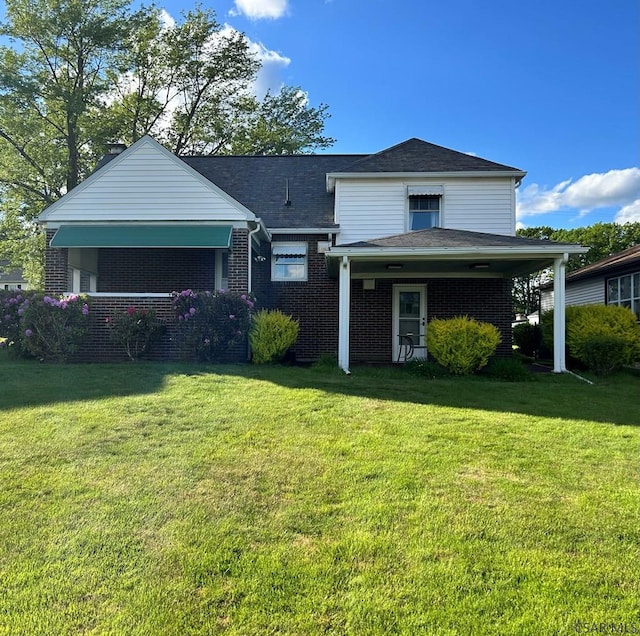 2269 Sunshine Ave, Johnstown, PA 15905 - view of front facade featuring a front yard and brick siding