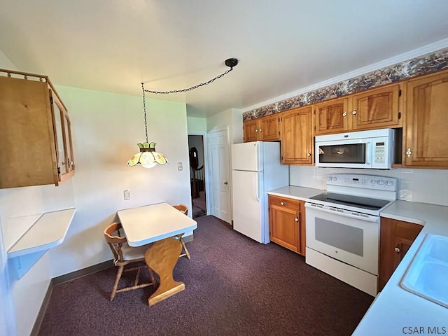 2269 Sunshine Ave, Johnstown, PA 15905 - kitchen featuring white appliances, light countertops, a sink, and brown cabinets