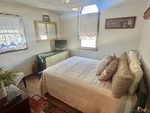 bedroom featuring baseboards