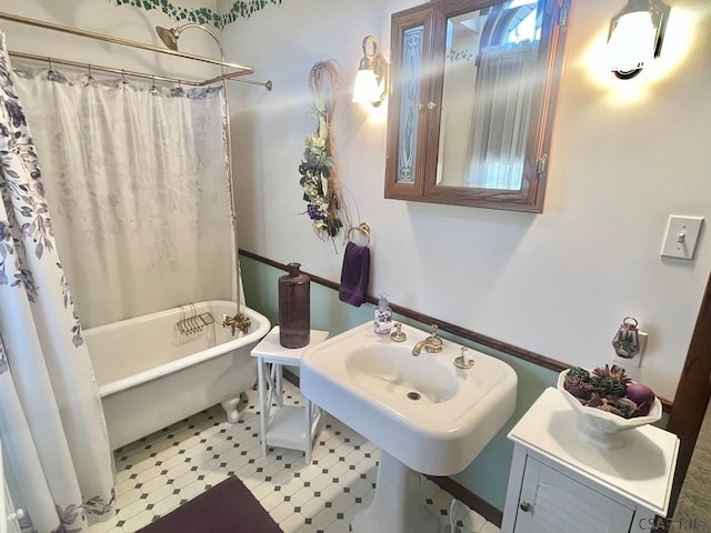 full bathroom with a shower with shower curtain and a bathtub