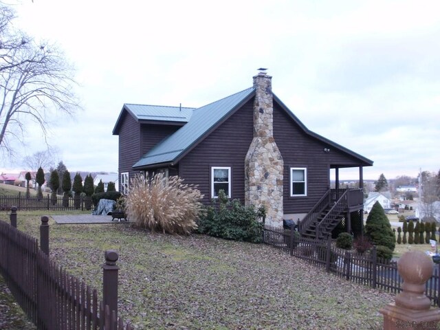 view of home's exterior with a patio area