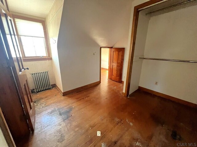 bonus room featuring radiator