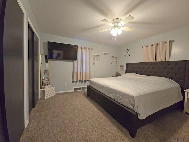 carpeted bedroom with ceiling fan