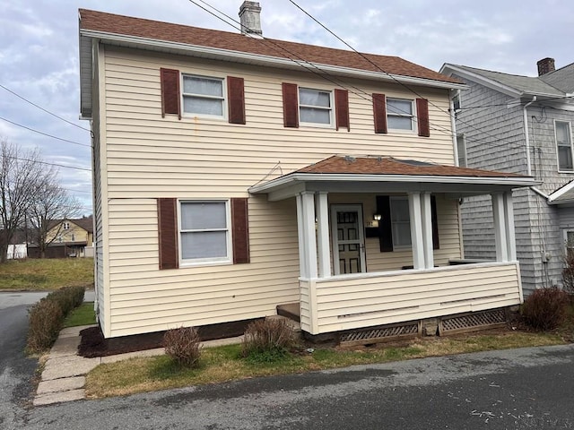 view of front of house with covered porch