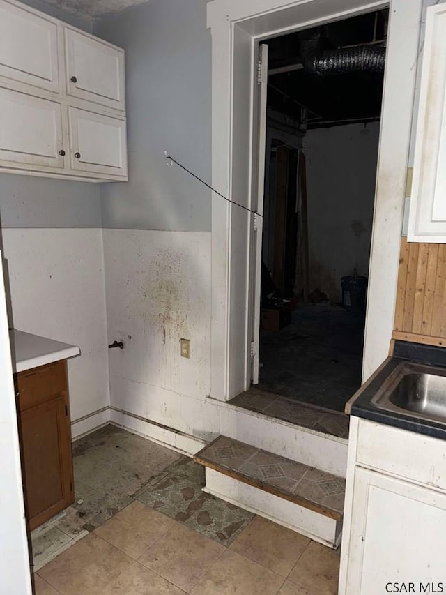 bathroom featuring a spacious closet