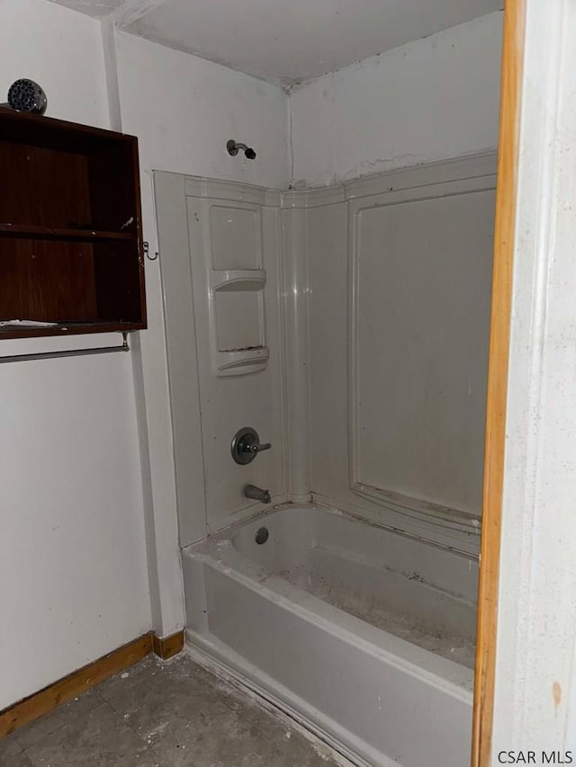 bathroom with  shower combination and baseboards