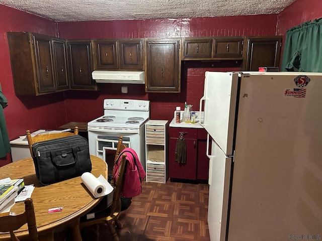 1008 Conemaugh Ave, Portage, PA 15946 - kitchen with white appliances, under cabinet range hood, dark brown cabinets, a textured ceiling, and light countertops