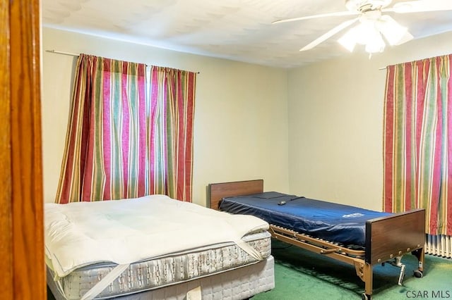 bedroom featuring carpet and a ceiling fan