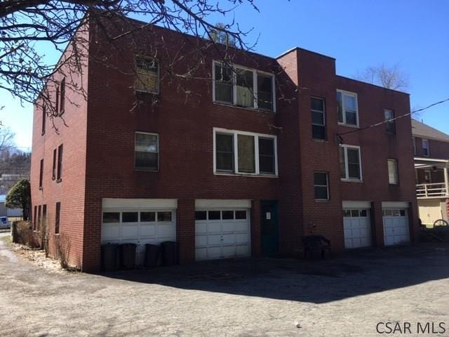 view of building exterior with a garage