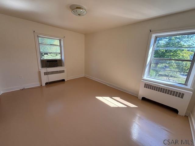 empty room featuring radiator