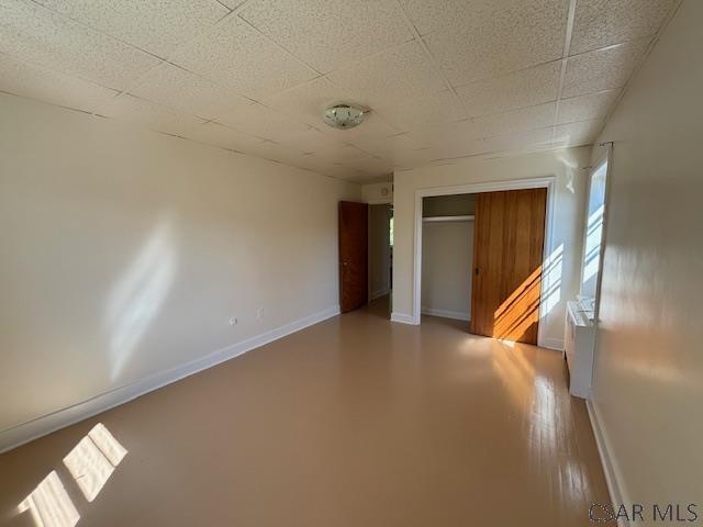 empty room featuring radiator heating unit