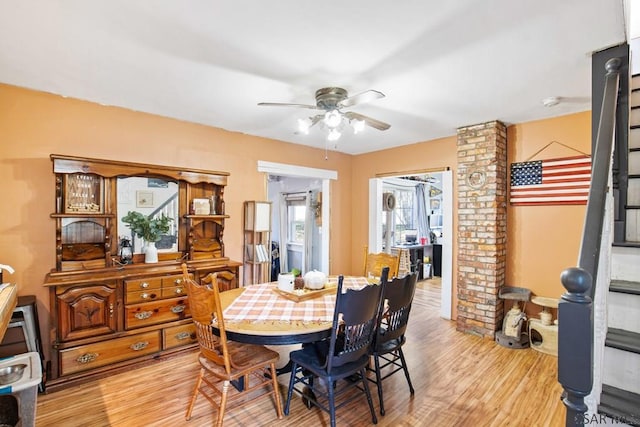 dining area featuring ceiling fan and light hardwood / wood-style floors