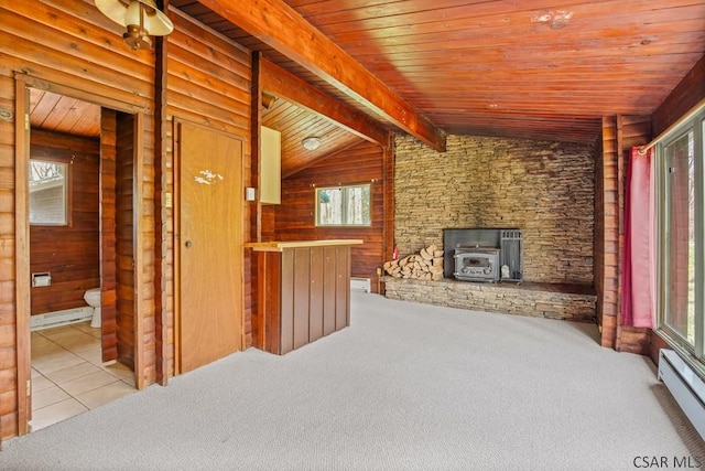 706 Laurel Summit Rd, Boswell, PA 15531 - unfurnished living room with a wood stove, baseboard heating, healthy amount of natural light, carpet flooring, and wood ceiling