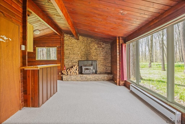 706 Laurel Summit Rd, Boswell, PA 15531 - unfurnished living room featuring a baseboard heating unit, wood ceiling, a wood stove, carpet floors, and lofted ceiling