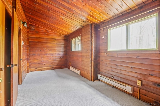 706 Laurel Summit Rd, Boswell, PA 15531 - carpeted empty room featuring a baseboard heating unit, lofted ceiling, wooden ceiling, and wood walls