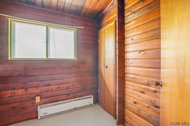 706 Laurel Summit Rd, Boswell, PA 15531 - hall featuring baseboard heating, carpet floors, wood ceiling, and wood walls