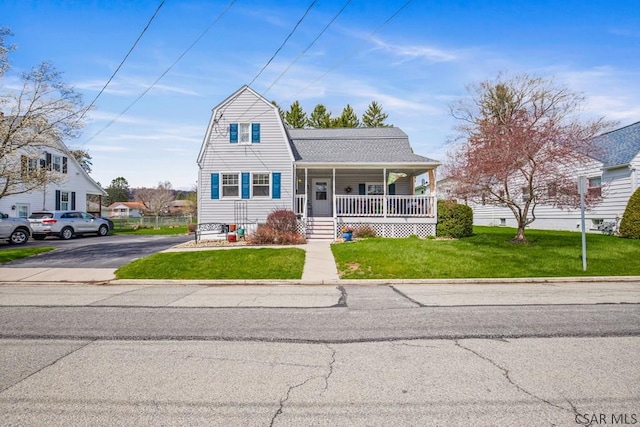352 W Garrett St, Somerset, PA 15501 - dutch colonial with a gambrel roof, a shingled roof, driveway, a porch, and a front yard