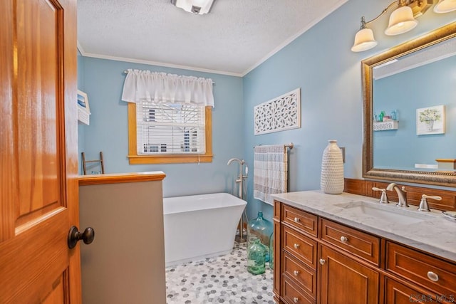 352 W Garrett St, Somerset, PA 15501 - bathroom featuring tile patterned floors, a textured ceiling, a freestanding tub, crown molding, and vanity