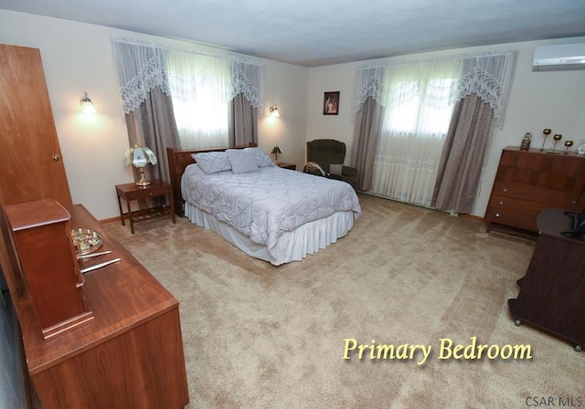 312 Furnari Ave, Johnstown, PA 15905 - bedroom with a wall mounted air conditioner and carpet flooring