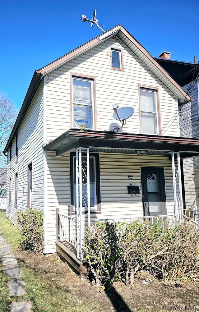 view of front of property featuring covered porch