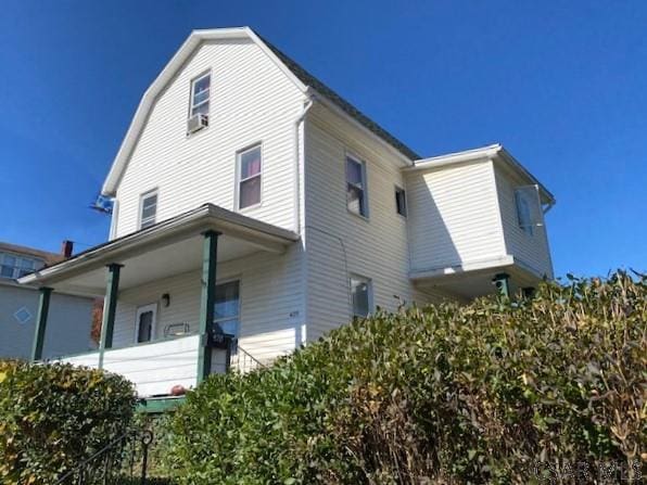 view of home's exterior with covered porch