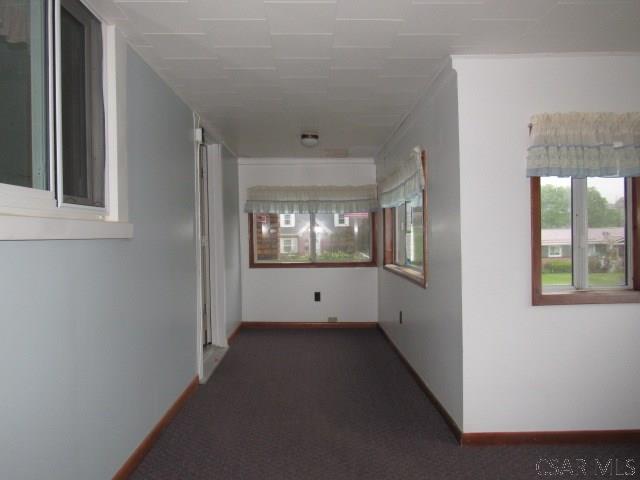 619 W Race St, Somerset, PA 15501 - hallway featuring baseboards and carpet flooring