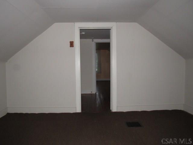 619 W Race St, Somerset, PA 15501 - additional living space with vaulted ceiling and baseboards