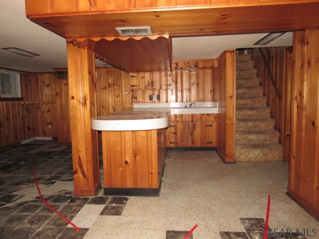 619 W Race St, Somerset, PA 15501 - indoor dry bar with stairway and wooden walls