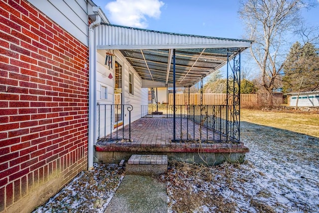 view of patio / terrace featuring fence