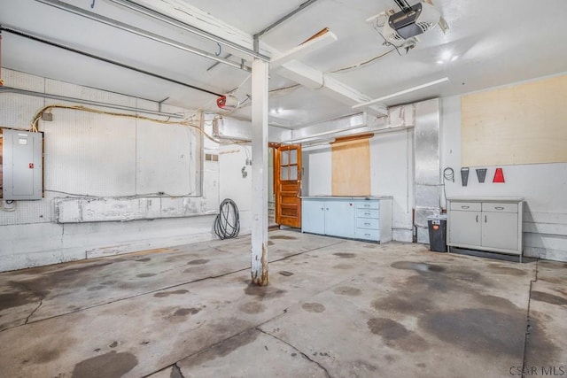 parking deck with electric panel and a garage door opener