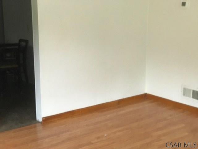532 1st St, Windber, PA 15963 - spare room with wood finished floors and baseboards