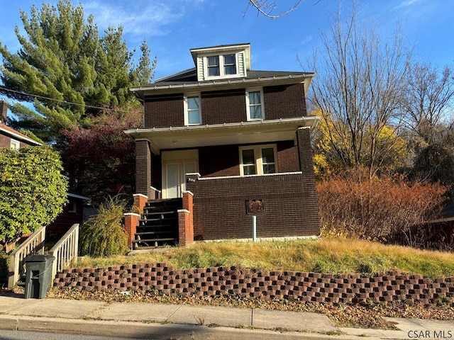 view of property with covered porch