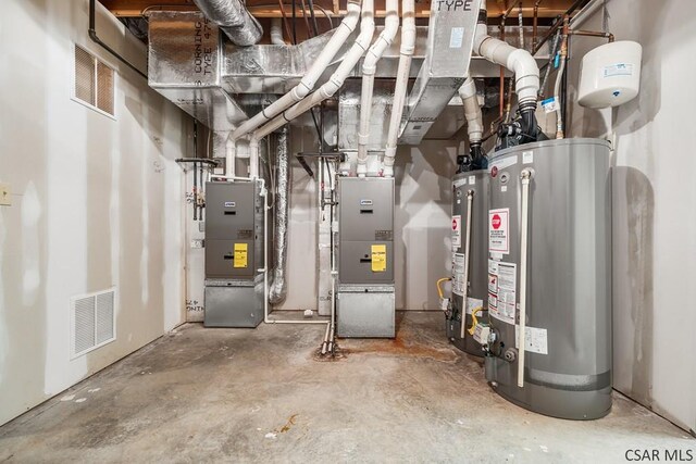 utilities with heating unit and gas water heater