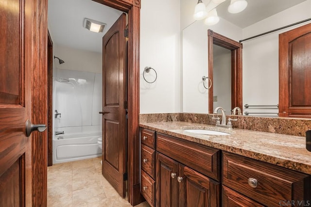 full bathroom featuring vanity, tile patterned floors, toilet, and shower / bath combination