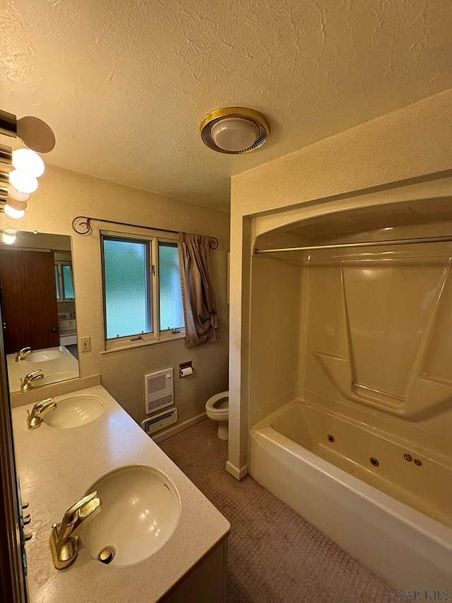 full bathroom featuring vanity, toilet, and shower / washtub combination