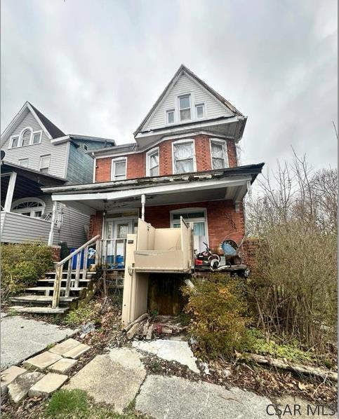 view of front of house with covered porch