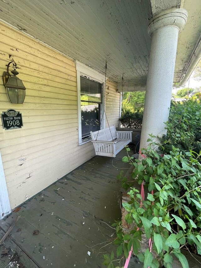 424 W Main St, Stoystown, PA 15563 - wooden deck with covered porch