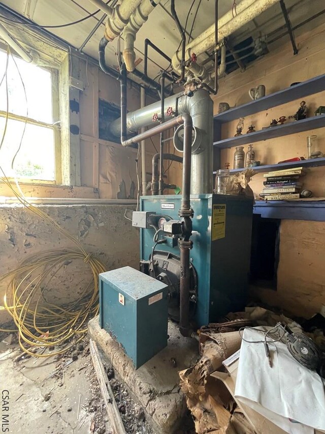 424 W Main St, Stoystown, PA 15563 - utility room featuring a heating unit