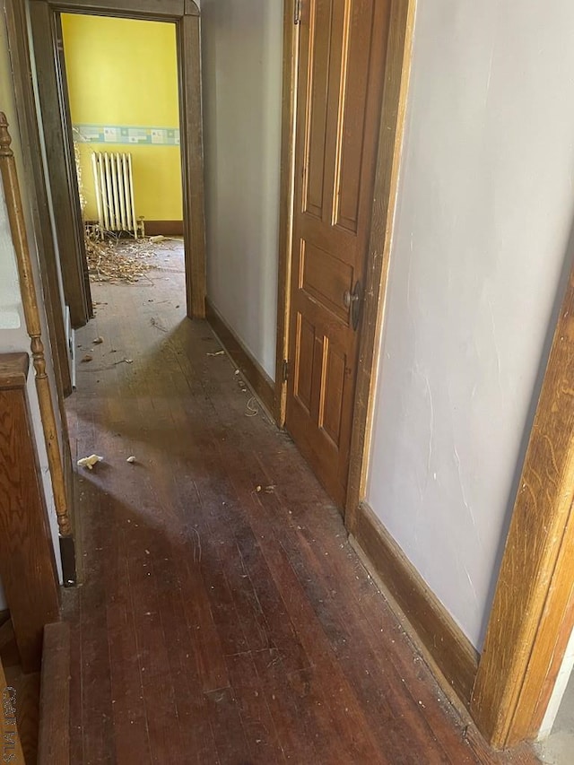 424 W Main St, Stoystown, PA 15563 - corridor with wood-type flooring, baseboards, and radiator