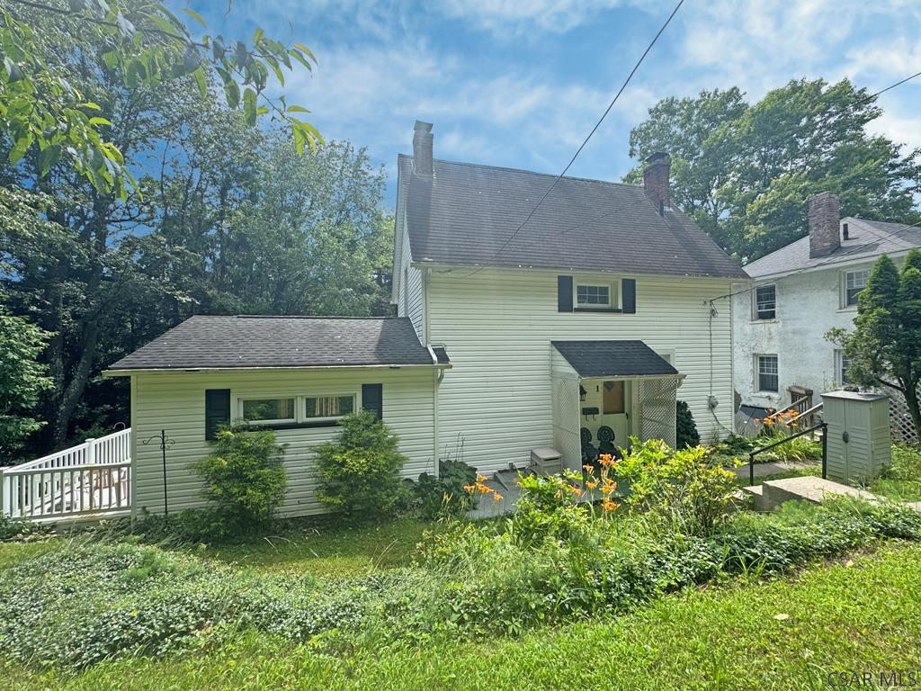 1 Shady Ln, Johnstown, PA 15905 - rear view of property with a chimney