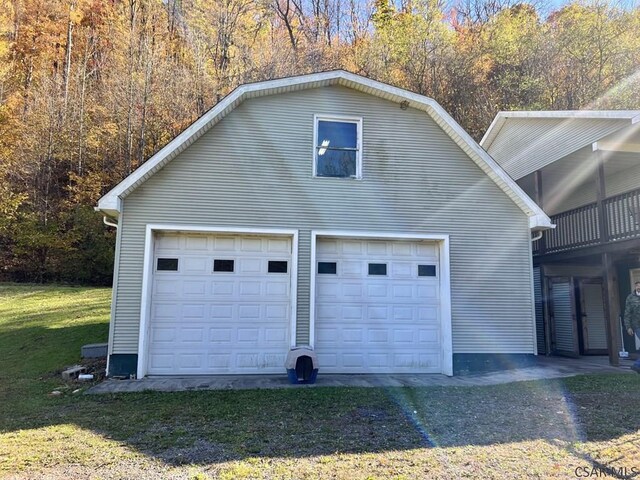 garage with a yard