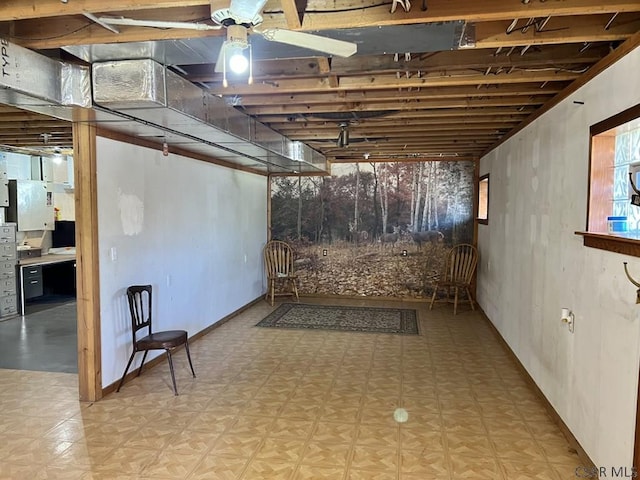 basement with ceiling fan