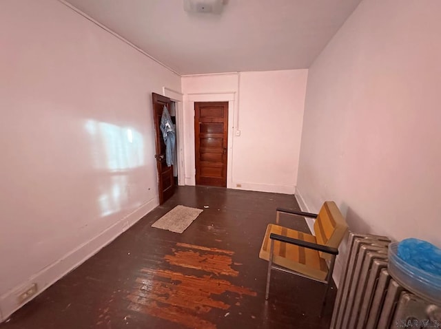 spare room featuring dark hardwood / wood-style floors