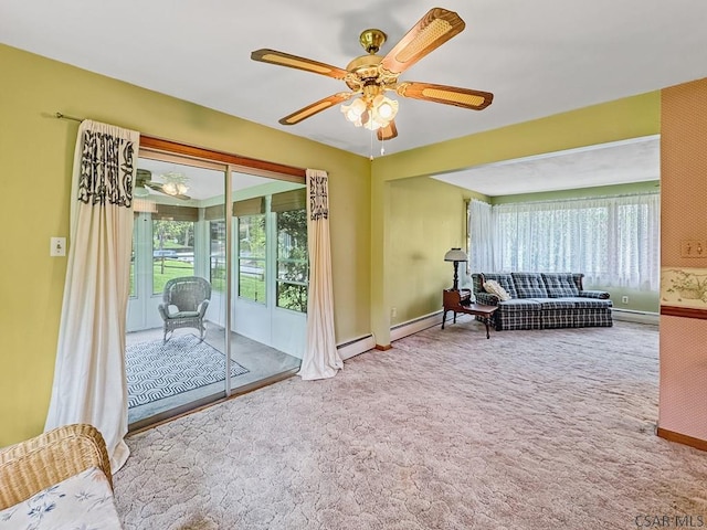 500 Randolph St, Ebensburg, PA 15931 - living area featuring healthy amount of natural light, baseboards, ceiling fan, and carpet floors