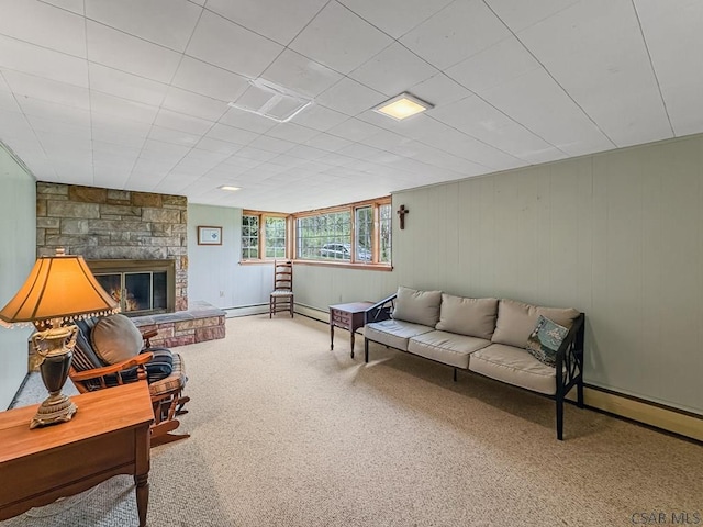 500 Randolph St, Ebensburg, PA 15931 - carpeted living area featuring a fireplace and wooden walls