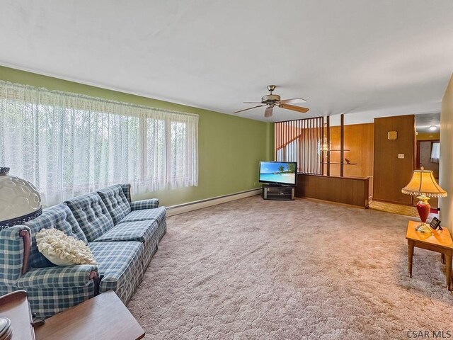 500 Randolph St, Ebensburg, PA 15931 - carpeted living area with ceiling fan, baseboard heating, and baseboards