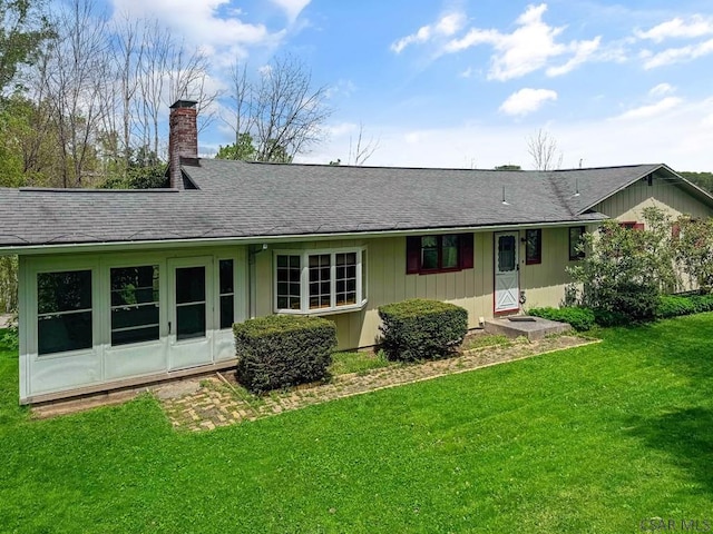 500 Randolph St, Ebensburg, PA 15931 - back of house featuring a lawn, a chimney, and roof with shingles