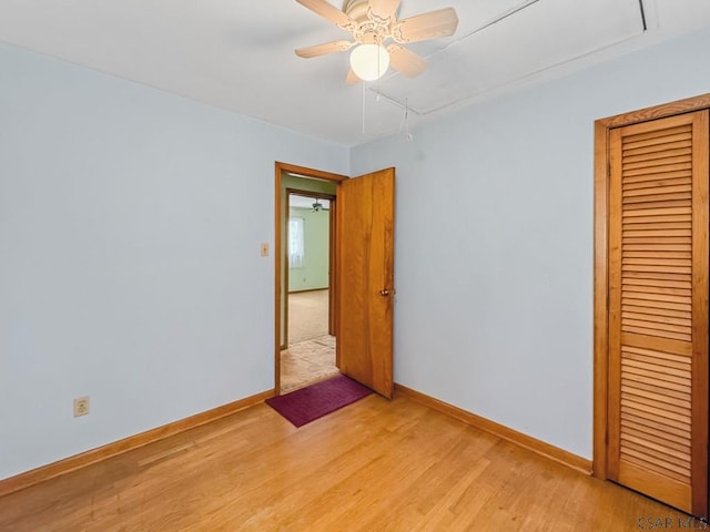 500 Randolph St, Ebensburg, PA 15931 - unfurnished bedroom featuring attic access, baseboards, light wood-type flooring, and a closet