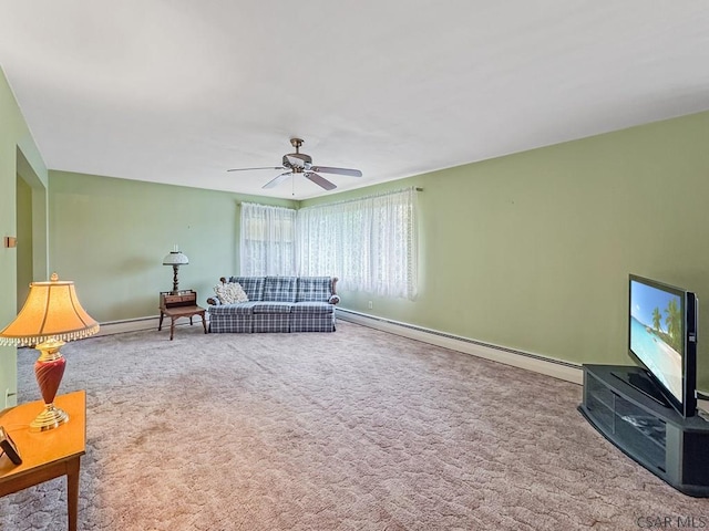 500 Randolph St, Ebensburg, PA 15931 - carpeted living area featuring ceiling fan, a baseboard radiator, and baseboards