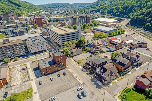 birds eye view of property with a mountain view